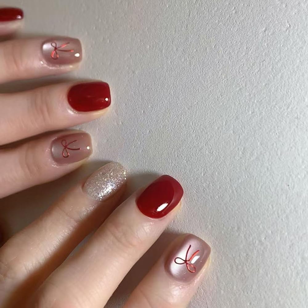 S.A.V.I 24Pcs Short Natural Shape Press-On Nails Red Nude Glitter Bow Design | Reusable DIY Nail Art with Glue & Adhesive Tabs | Trendy Fake Nails for Women & Girls