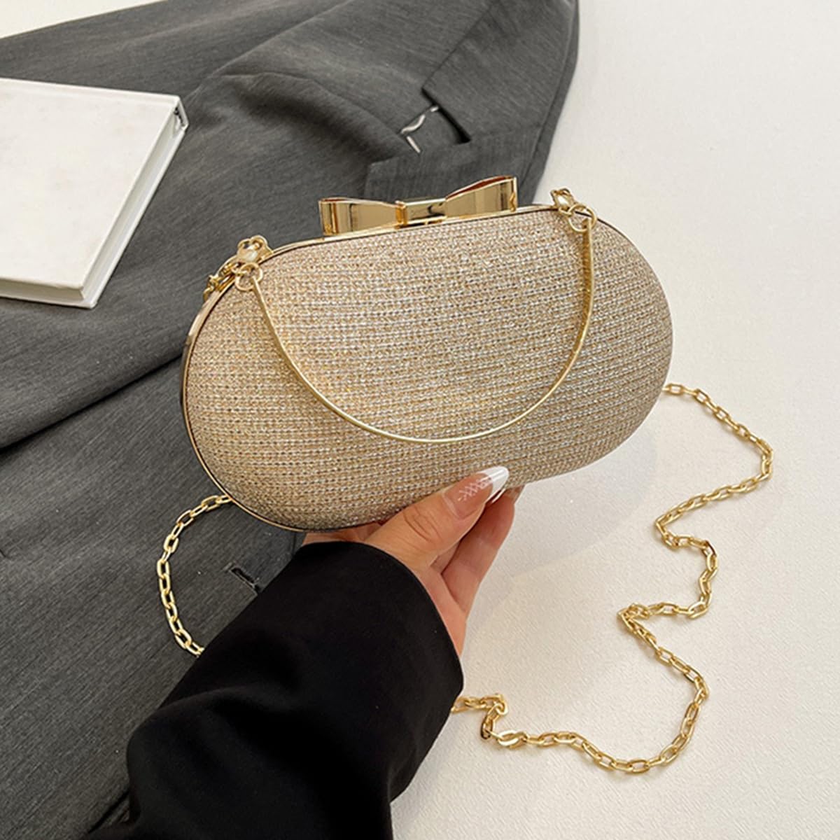 S.A.V.I Women’s Gold Glitter Clutch Bag – Oval Hard Case Evening Purse with Chain & Bow Design, Party & Wedding Handbag (Gold)